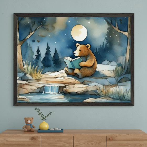 Modern room with a light blue-green wall and a wooden dresser. A large framed watercolor painting of a brown bear reading a book by a waterfall under a full moon in a starry forest hangs centered above the dresser. A teddy bear, yellow vase, and tray are on the dresser.