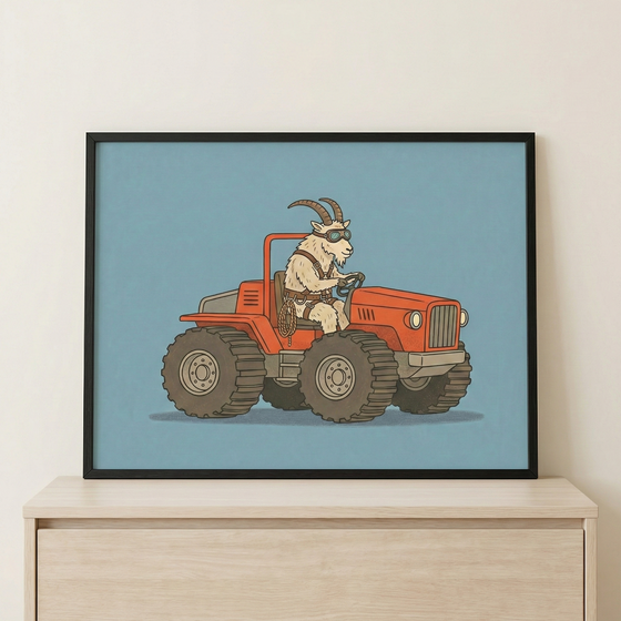 Framed wall art featuring an animal goat wearing goggles and driving an orange car, sitting on a light-colored wooden cabinet against a plain white wall.