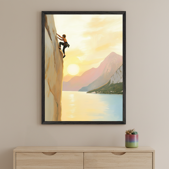 Modern room with a light wood media console. A large framed painting of a rock climber on a cliff by a calm lake with mountains at sunset hangs above the console. An orange floor lamp stands left, and a recessed shelf with blue and orange pillows is on the wall.