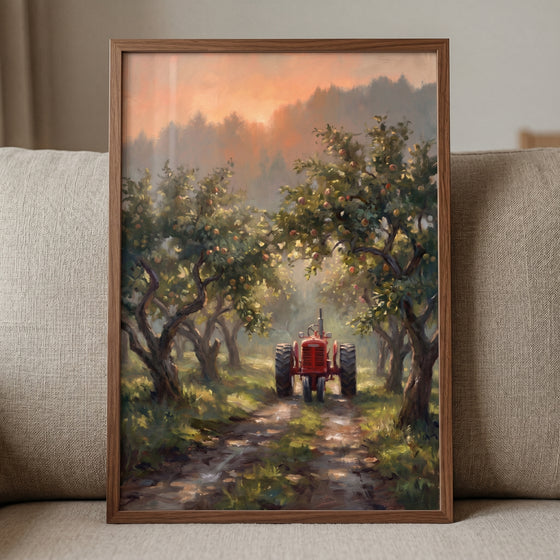 Apple orchard red tractor wall art depicting a vintage vehicle on a sunlit path through rows of fruit trees at sunset.