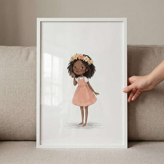 Apricot pinafore curly girl wall art in a white frame featuring a young girl with a flower crown and dark curls.