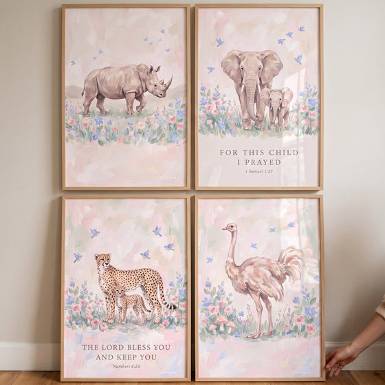 Chic pink savanna animals artwork set of 4 featuring a rhino, elephant, cheetah, and ostrich with biblical verses.