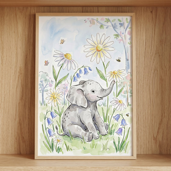 Watercolor daisy meadow baby elephant wall art shows a small elephant sitting among white daisies, bluebells, and bees.