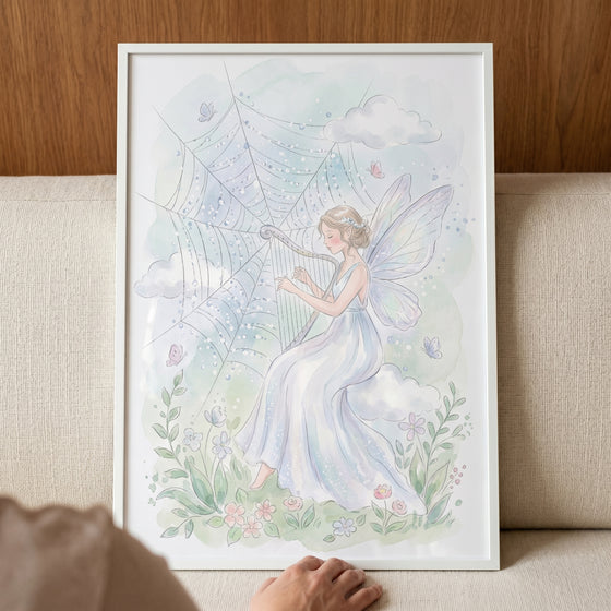 Framed dreamy harp playing fairy wall art depicts a winged woman playing a spiderweb harp among pastel clouds and flowers.