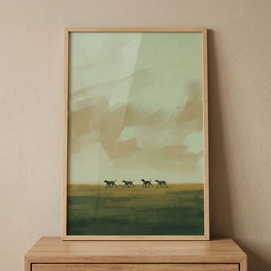 A vertical minimalist illustration of four slender canine silhouettes walking in a line across a level horizon. The composition features a dark moss-green horizontal band in the foreground. Above the dogs, the background is an abstract arrangement of large, textured sweeps of sage green and warm beige, creating a sense of a distant landscape. The style is modern and serene, characterized by broad, visible strokes and a muted earth-tone color palette.