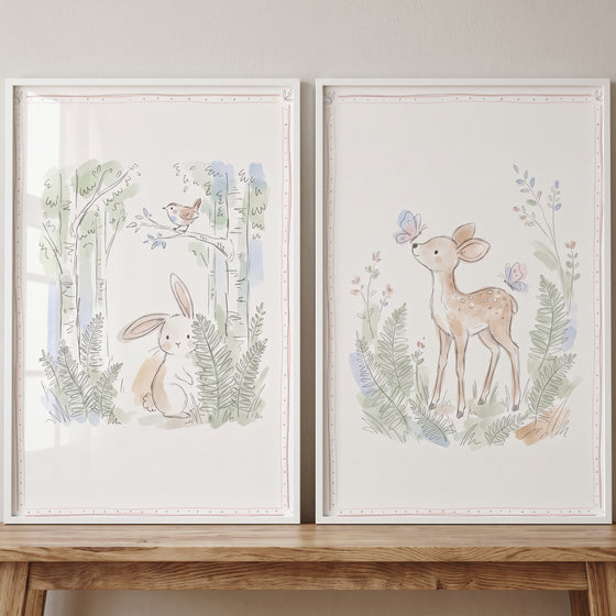 Earthy sage woodland animal wall art set of 2 featuring watercolor illustrations of a rabbit and a fawn in a forest.