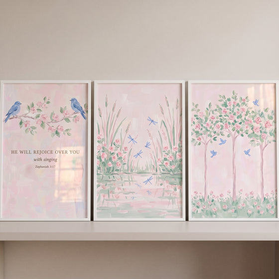 Enchanted watercolor pink garden wall art set of 3 featuring blue birds, pink flowers, dragonflies, and a Bible verse.