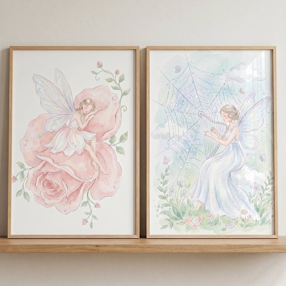 Enchanted winged fairy wall art set of 2 with a fairy sleeping on a rose and a fairy playing a harp made of spiderwebs.