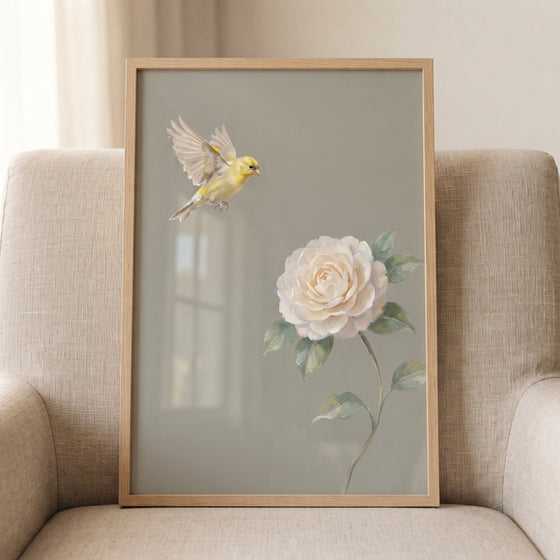 Flying vintage yellow bird floral wall art features a yellow bird and white rose against a muted grey background.