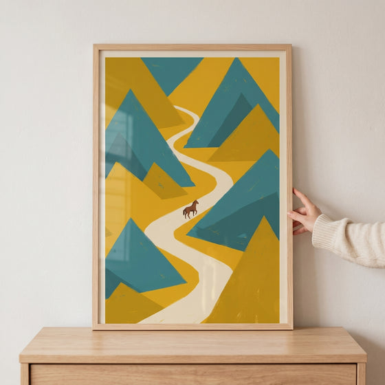 Framed geometric mountain brown horse wall art shows a brown horse on a winding white path between teal and yellow peaks.