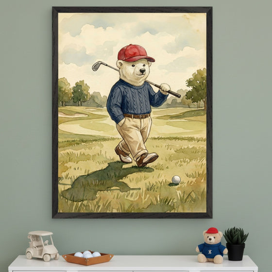 Kid's room with a green wall and white dresser. A framed watercolor painting of a polar bear in a red cap and blue sweater, holding a golf club on a golf course, hangs above the dresser.