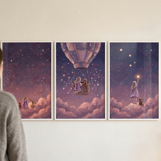 Hazy dusk girl dog wall art set of 3 featuring a child and dog in a hot air balloon and on clouds under a starry night sky.