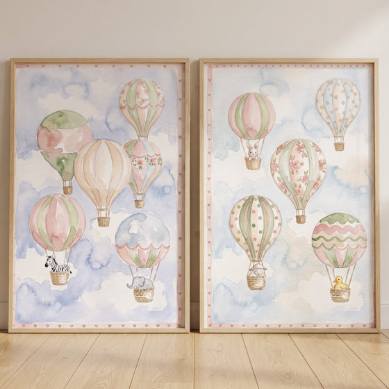 Heart hot air balloon wall art set of 2 features pastel watercolor balloons with cute animals in a soft sky.