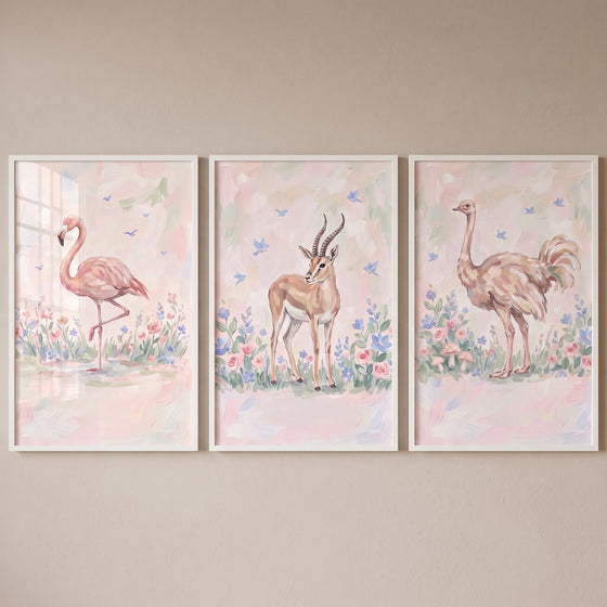 Impressionist meadow safari animals wall art set of 3 featuring a flamingo, a gazelle, and an ostrich in white frames.