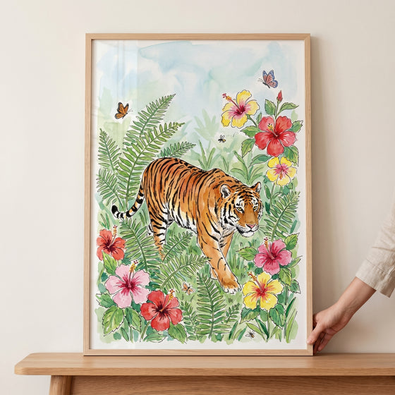 Lush hibiscus floral tiger wall art featuring a tiger walking through vibrant tropical flowers and green ferns.