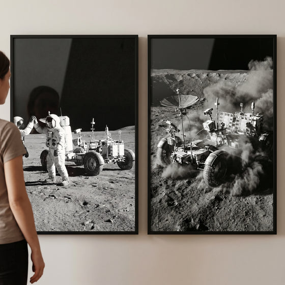 Monochrome lunar expedition rover wall art set of 2 in black frames showing astronauts and a vehicle on the moon.