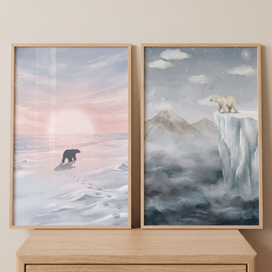 Muted arctic polar bear wall art set of 2 shows bears in snowy landscapes under a sunset and a starry night sky.