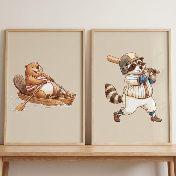 Muted tone athletic animals print set of 2 featuring a rowing beaver and a raccoon baseball player.