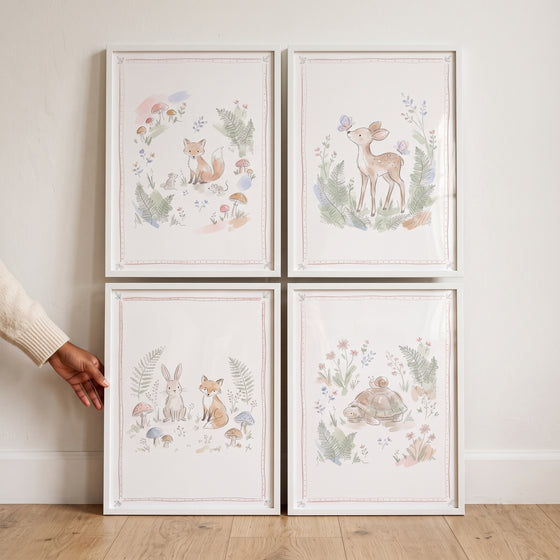 Muted tone forest creatures wall art set of 4 featuring a fox, deer, rabbit, and turtle in watercolor-style illustrations.