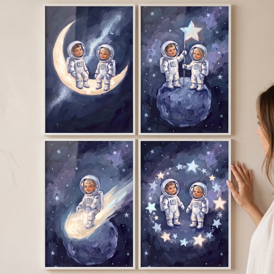 Navy galaxy baby astronaut wall art set of 4 features toddlers in spacesuits on a crescent moon and among bright stars.