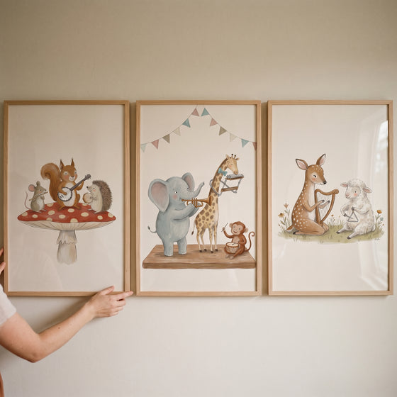 Ochre cream musical animal wall art set of 3 featuring whimsical forest animals playing instruments in wood frames.