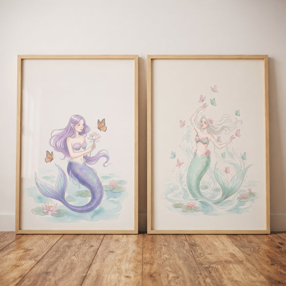 Pastel floral butterfly mermaid wall art set of 2 features purple and green mermaids with butterflies and lilies.