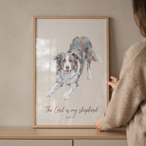 Framed psalm 23 border collie wall art featuring a dog in a play bow with religious text, held up by a person.