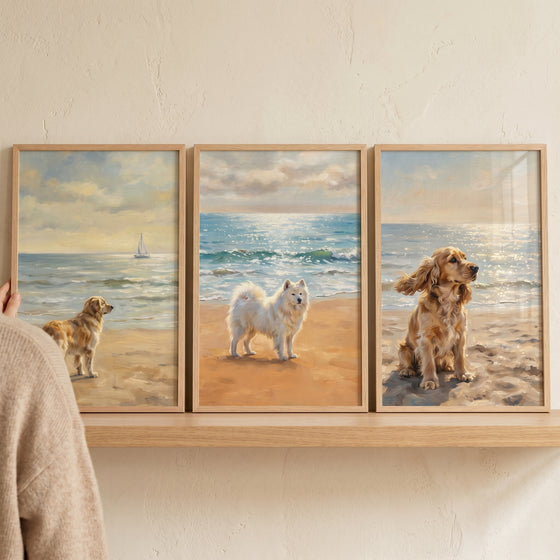 Serene oceanfront sandy dog wall art set of 3 featuring a golden retriever, a white fluffy dog, and a cocker spaniel.