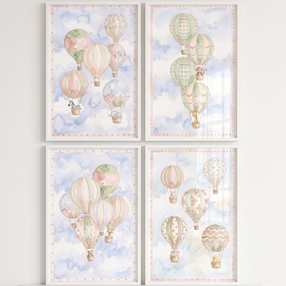 Serene watercolor safari balloon wall art set of 4 shows cute animals in pastel hot air balloons among soft blue clouds.