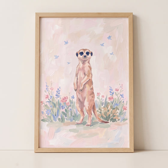 A meerkat stands among flowers and birds in this soft animal bloom meerkat floral wall art within a natural wood frame.
