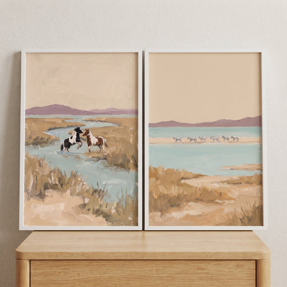Soft neutral coastal horse wall art set of 2 featuring wild horses in a marshy river and shoreline landscape.