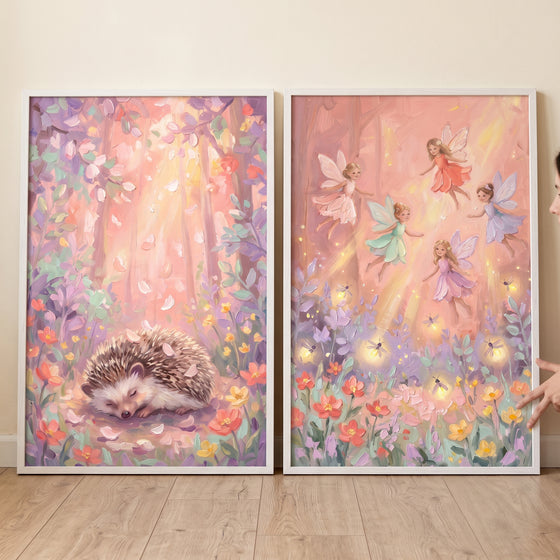 Soft pink enchanted forest wall art set of 2 featuring a sleeping hedgehog and flying fairies among colorful flowers.