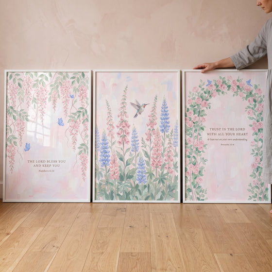 Soft watercolor floral garden wall art set of 3 featuring scripture, pink flowers, a hummingbird, and blue butterflies.