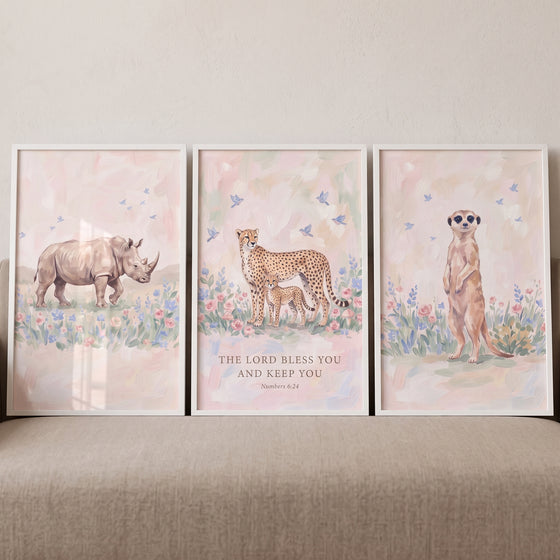 Songbird flight safari animals wall art set of 3 with a rhino, cheetah, and meerkat in a soft pastel floral design.