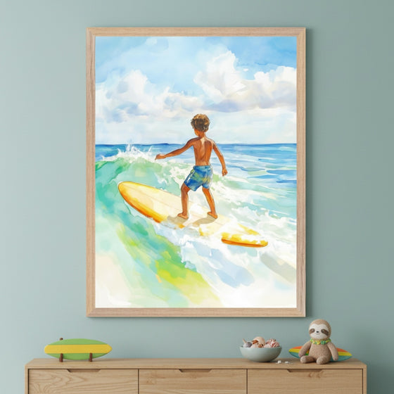 Child rides a soft wave on a yellow surfboard, set against a tranquil watercolor backdrop of the open sea and a partly cloudy sky. The painting adds a splash of summer energy above a dresser decorated with ocean-themed toys.