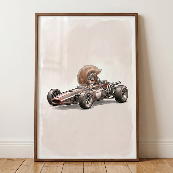 Vintage racing car squirrel wall art showing a squirrel in goggles driving a classic race car in a brown frame.