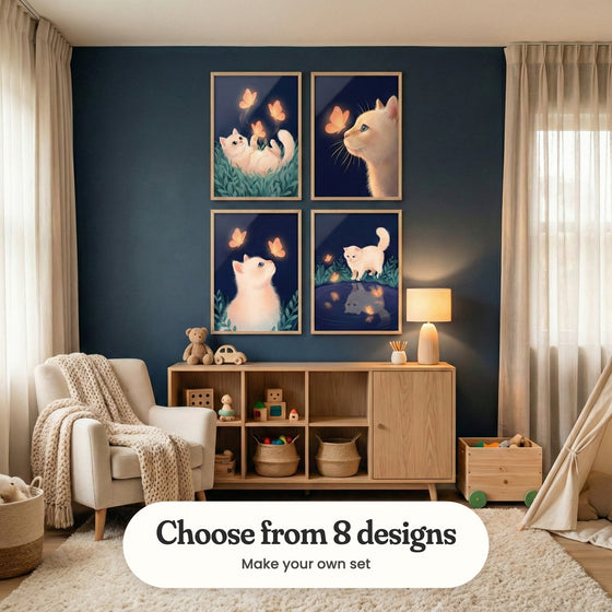 Navy blue nursery with four glowing cat prints in light wood frames in two rows above a light wood toy shelf with a teddy bear, a toy car and a table lamp, beside a cream armchair with a knit throw and a play tent: Golden Butterfly Glow, Whiskers And Wings, Glowing Butterfly Dream and Glowing Feline Reflection, with a label reading Choose from 8 designs, Make your own set