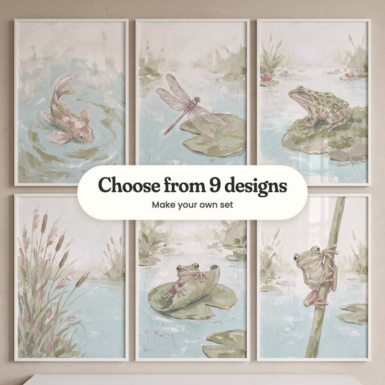 Six lily pond prints in white frames in two rows on a beige wall: a pink and cream koi, a pink-winged dragonfly on a lily pad, a spotted frog on a mossy rock, cattails and pink reeds, a frog peeking over a curled lily pad and a tree frog climbing a reed, with a label reading Choose from 9 designs, Make your own set