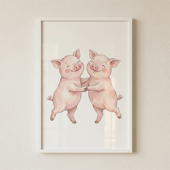 Watercolor dancing pink pigs wall art featuring two happy pigs holding trotters and dancing in a white frame.
