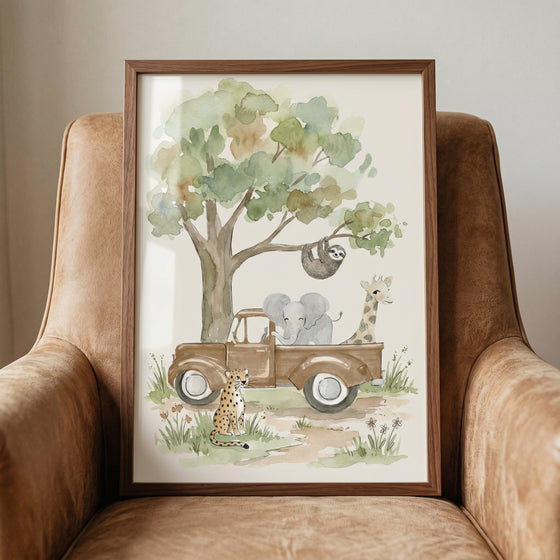 Watercolor vintage truck animals wall art with an elephant, giraffe, sloth, and cheetah by a tree in a wood frame.