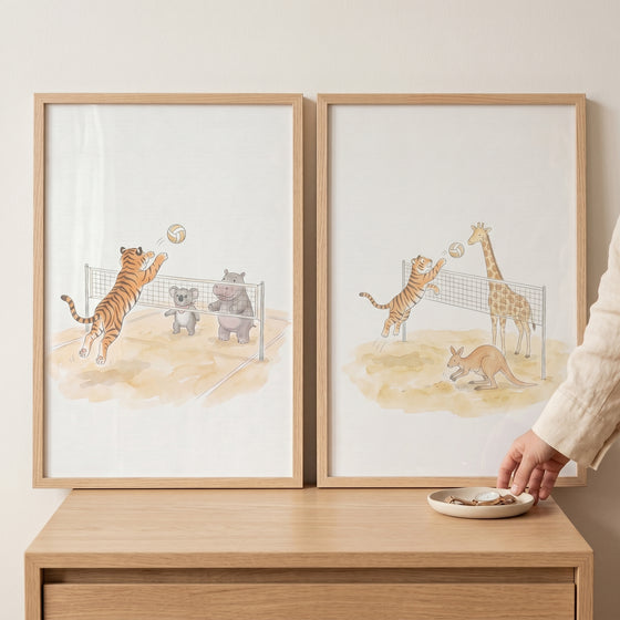 Watercolor volleyball tiger wall art set of 2 featuring zoo animals playing sports, displayed on a wooden dresser.