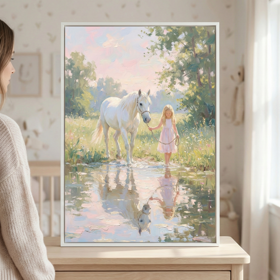 A woman admires a framed painting of a young girl in a pink dress leading a white horse through a sunlit meadow, with their reflections visible in a tranquil water puddle.