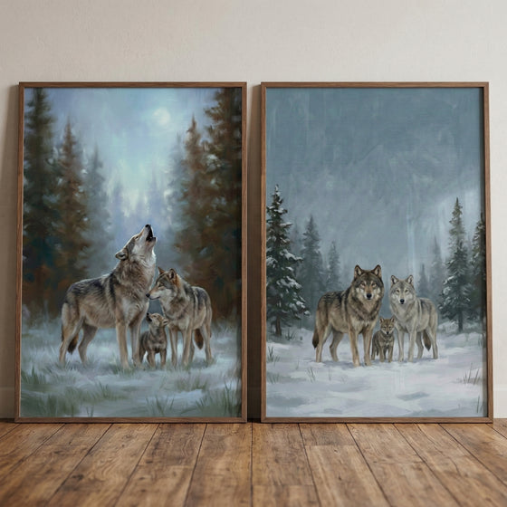 Two framed paintings show a small wolf family in quiet winter forests. One scene shows three adult wolves and a pup standing in snowy grass while one wolf lifts its head to howl beneath a pale moon, surrounded by tall pine trees. The second painting shows the wolves standing together in a snowy clearing with misty trees fading into the cold blue background.