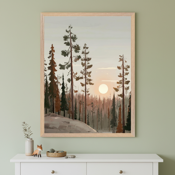 Modern room with a white dresser. A large framed artwork depicting a stylized forest landscape with tall pine trees and a setting sun hangs centered above the dresser. A small fox figurine, a vase with greenery, and a woven basket with rocks are on the dresser.