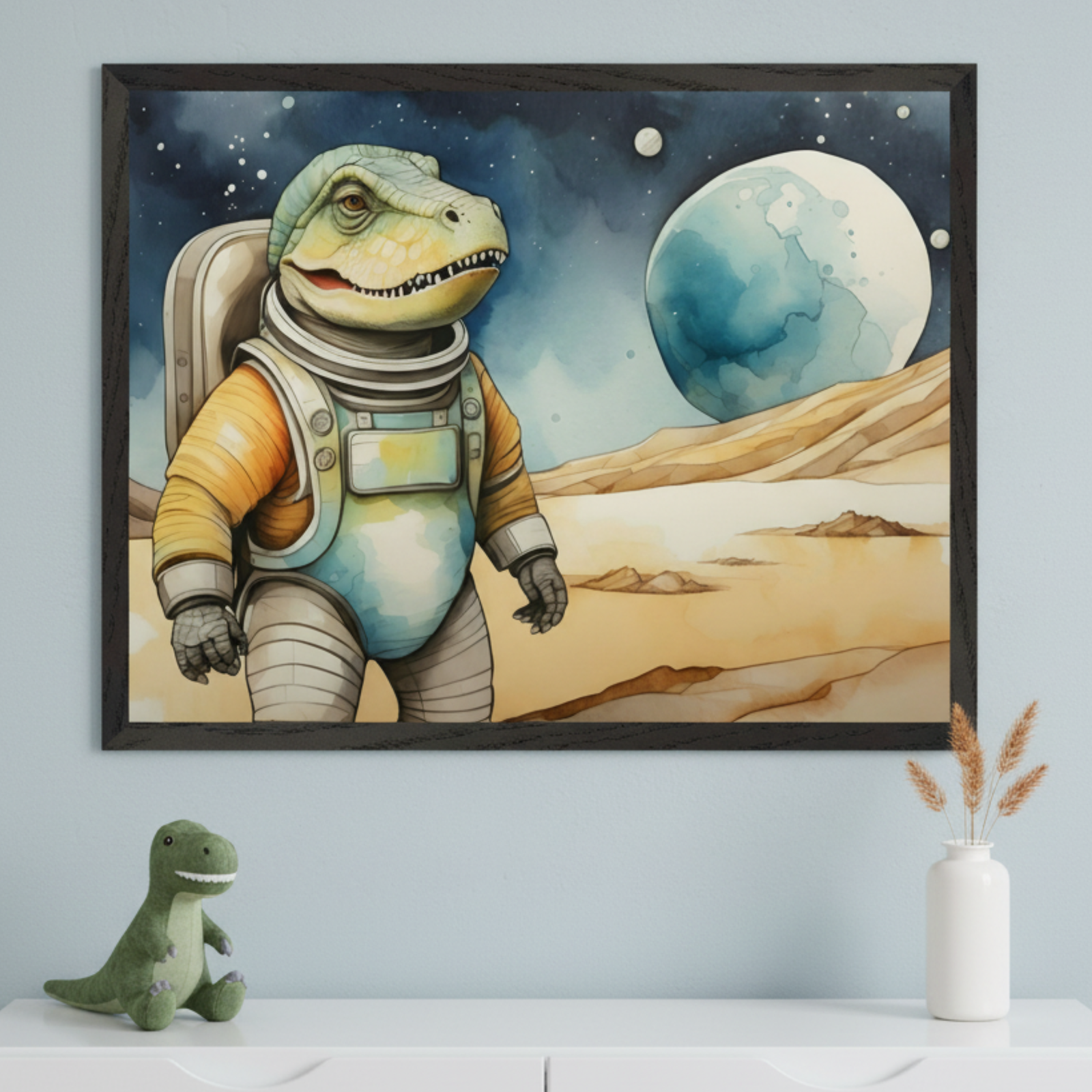 Modern kid's room with a light blue wall, white dresser. A black-framed watercolor print of a dinosaur astronaut on a sandy planet with a blue moon hangs above. A green toy dinosaur and a vase are on the dresser.