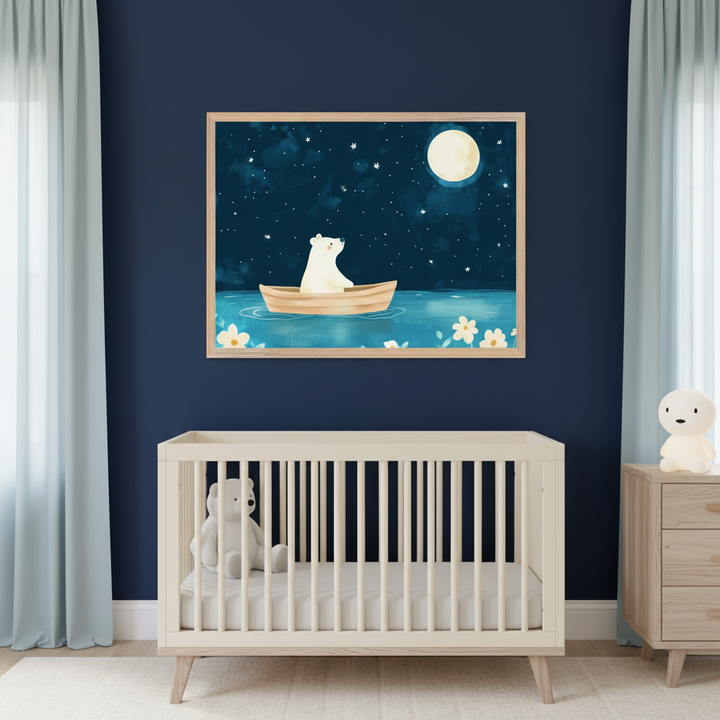 Modern nursery with dark blue walls. A white wooden crib is centered, with a light wood dresser on the right. Above the crib hangs a framed watercolor-style print of a white polar bear in a boat on blue water at night, under a full moon and stars, with white flowers.