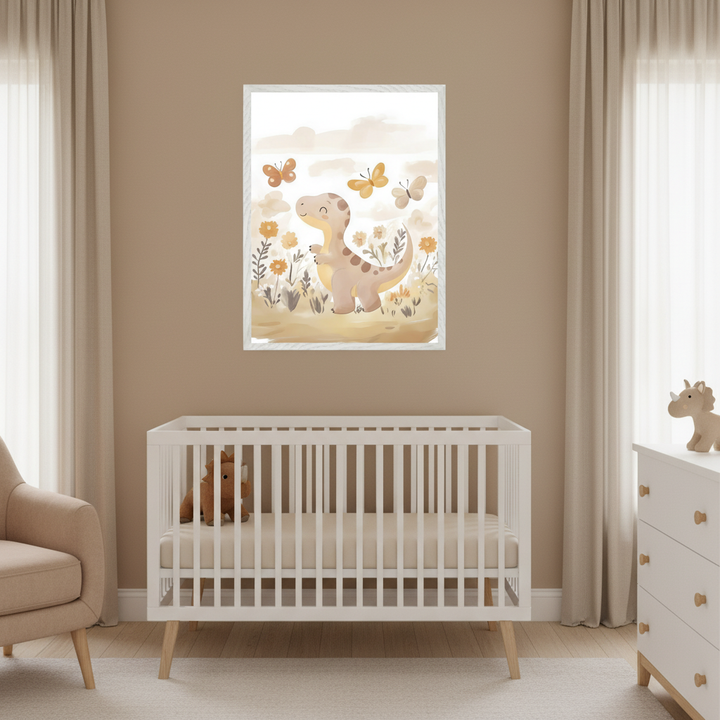 Modern nursery with a white crib, beige armchair, and white dresser. A framed watercolor print of a smiling dinosaur in a field of yellow flowers with butterflies hangs above the crib.