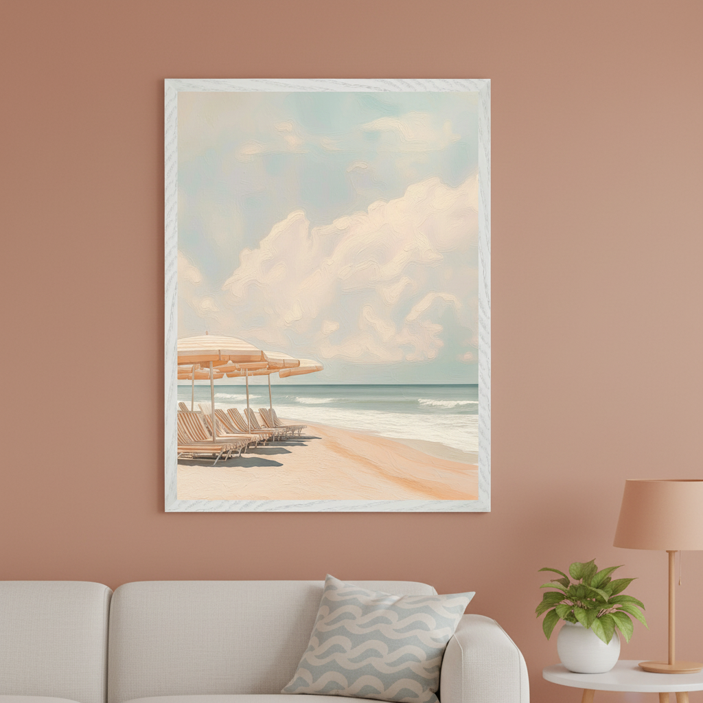 Modern living room with a white sofa. A large framed painting of a serene beach with striped umbrellas, lounge chairs, a calm ocean, and fluffy clouds hangs above the sofa.