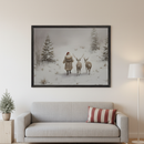 Modern living room with a light gray sofa. A large black-framed print of Santa and two deer walking through a snowy forest hangs centered above the sofa. A small potted evergreen is on a wooden block table.