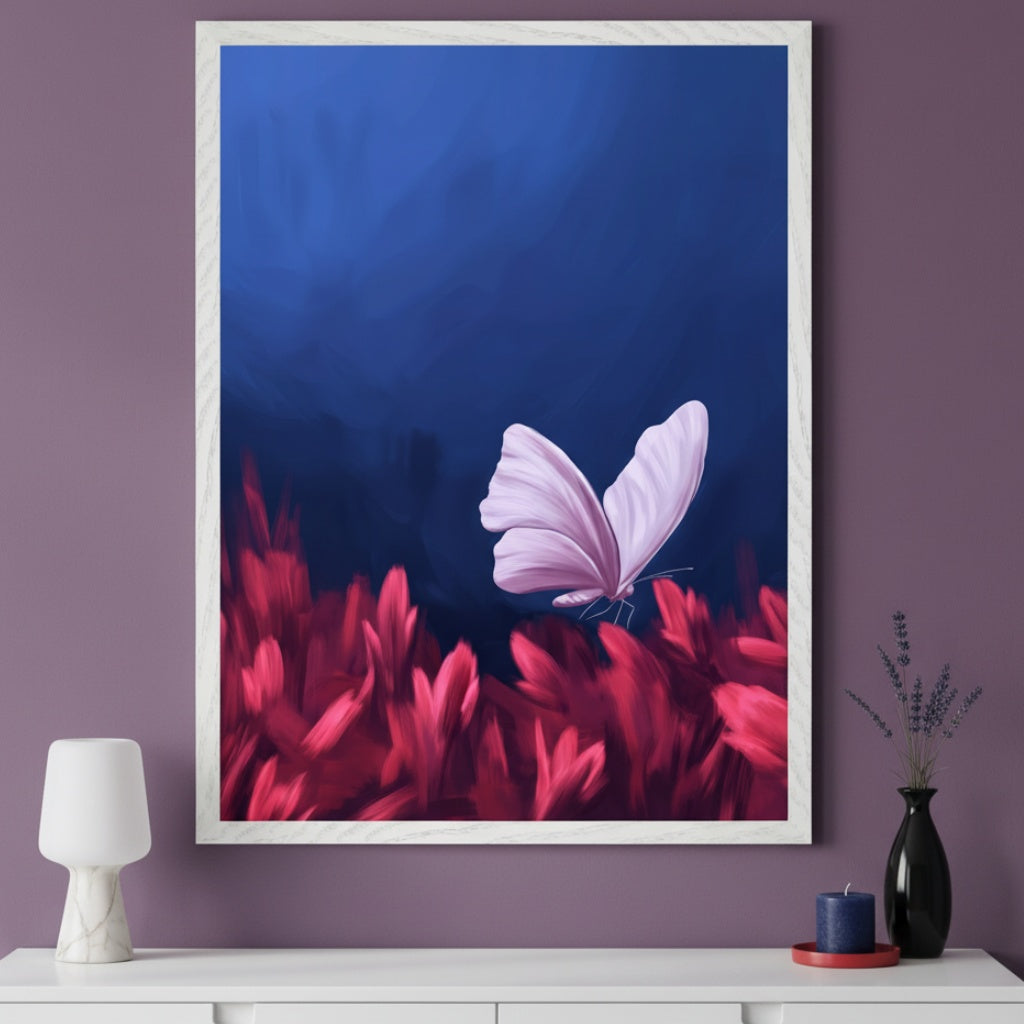 Modern room with a white dresser. A large framed painting of a pink butterfly on red plants against a dark blue background hangs centered above the dresser. A white lamp, black vase with lavender, and a blue candle are on the dresser.